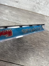 Puggsy (Sega CD, 1993) - Tested Working (Water Damage)