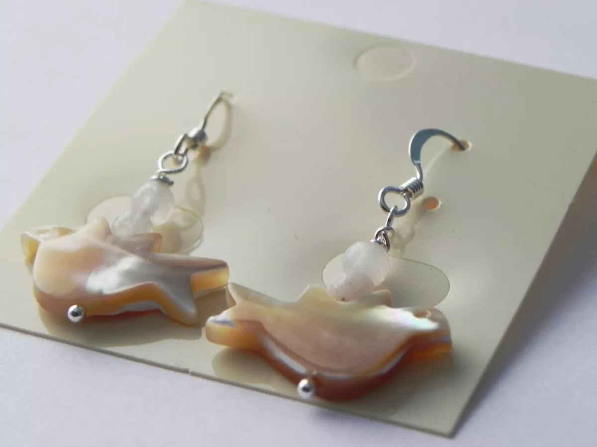 Gorgeous sterling silver earrings with dove shaped shell pieces and aventurine