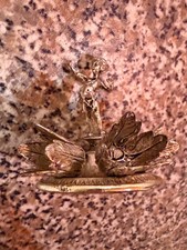 Vintage unique silver plate  statue surrounded by flowers figurine