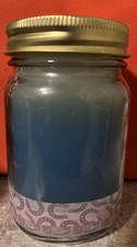 1 blueberry pie scented jar candle. glass container, metal lid. 