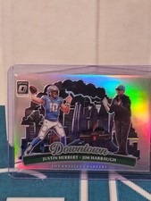 JUSTIN HERBERT JOHN HARBAUGH 2025 Donruss Optic Downtown Duos Chargers Case Hit