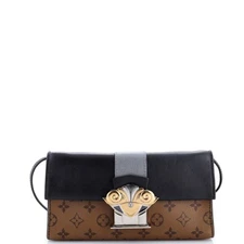 Louis Vuitton Column Clutch Reverse Monogram Canvas with Calfskin