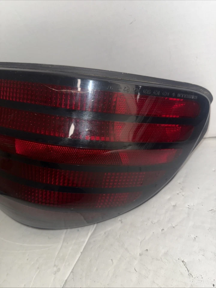 Luz trasera izquierda Pontiac Grand AM 1999 2000 2001 2002 2003 2004 2005 OEM Foto 3 de 4