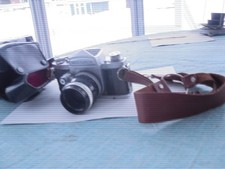 Miranda 35mm Camera with Case and Strap.