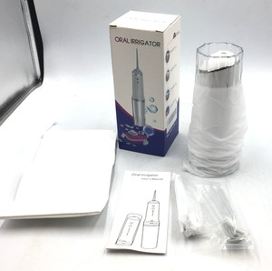 Oral Irrigator 4 Modes 5 Nozzles 300ml Water Tank Waterproof New Complete In Box