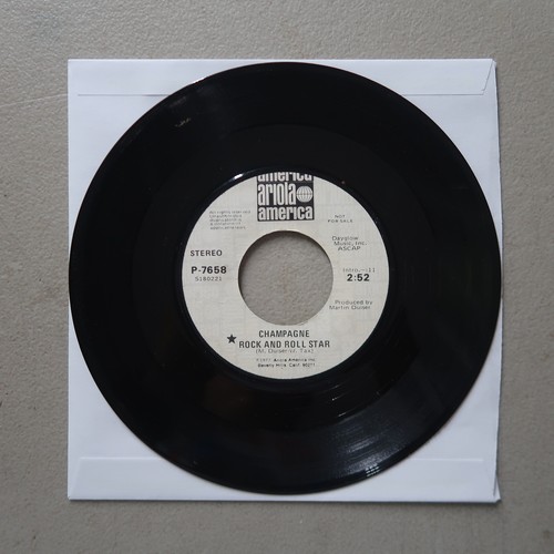 CHAMPAGNE ROCK AND ROLL STAR PROMO VINYL 45 ARIOLA AMERICA 13-179