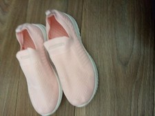 Ladies sport shoes, in pink, fabric uppers.