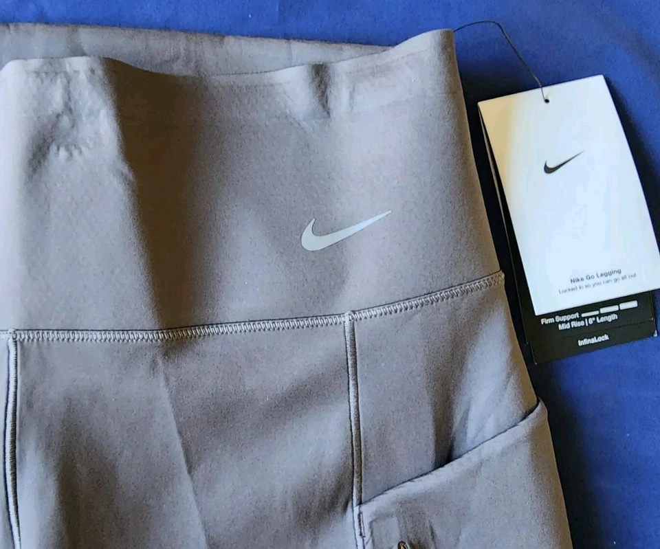 NIKE GO MUJER RUNNING FIRME SOPORTE TIRO MEDIO MOTOCICLISTA 8” PANTALONES CORTOS GRIS #DQ5925-NUEVO CON ETIQUETAS Foto 4 de 4