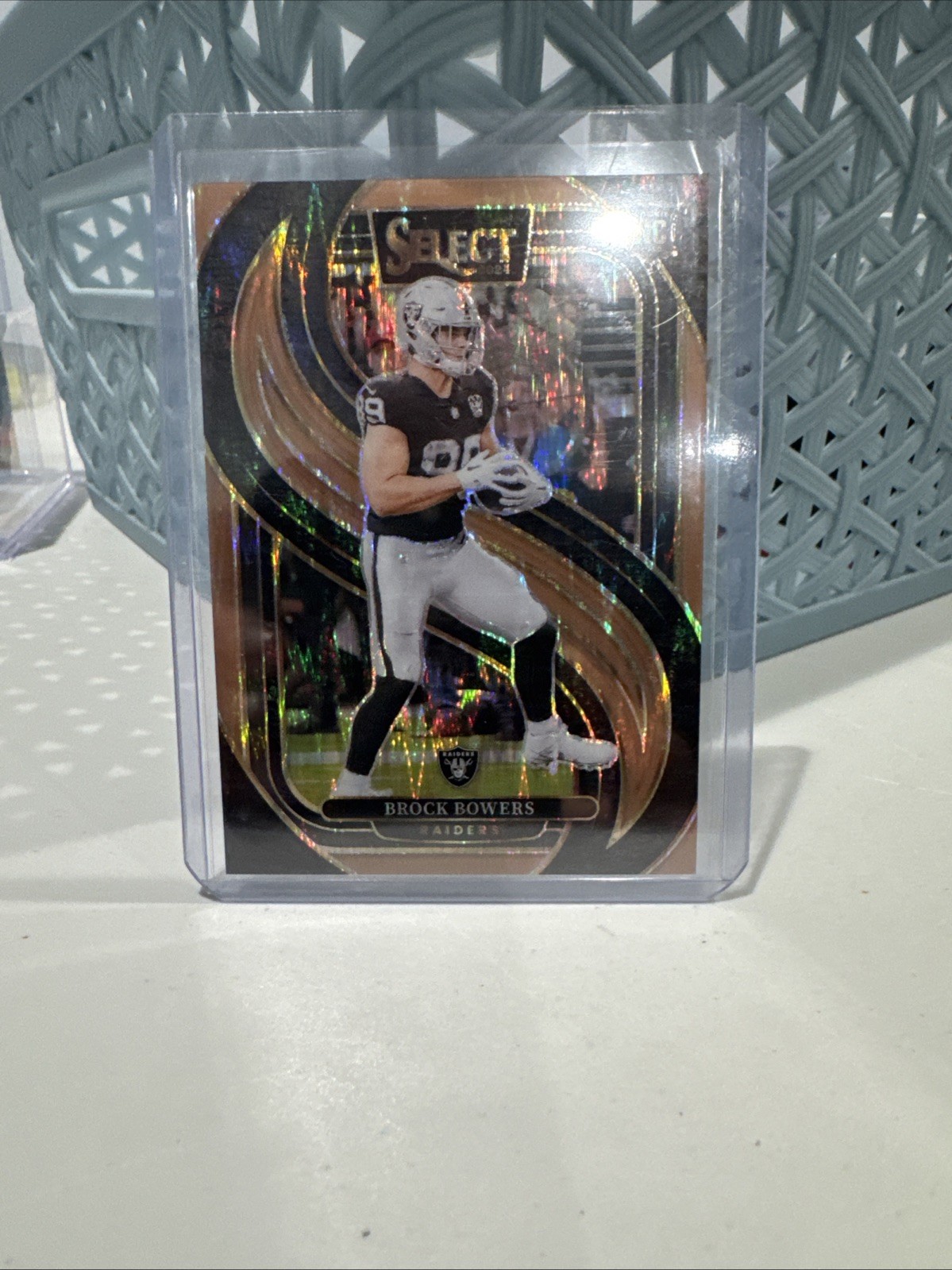 2024 Panini Select Brock Bowers 118 RC 49/299 Copper Shock Prism