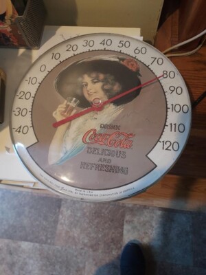 vintage round coca cola thermometer sign