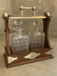 Antique Oak Two Cut Glass Bottle Tantalus Decanter Set