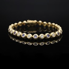 Bracciale tennis diamanti tanzanite 2,10 ct oro 750 dettagli gioielli ottimo ...