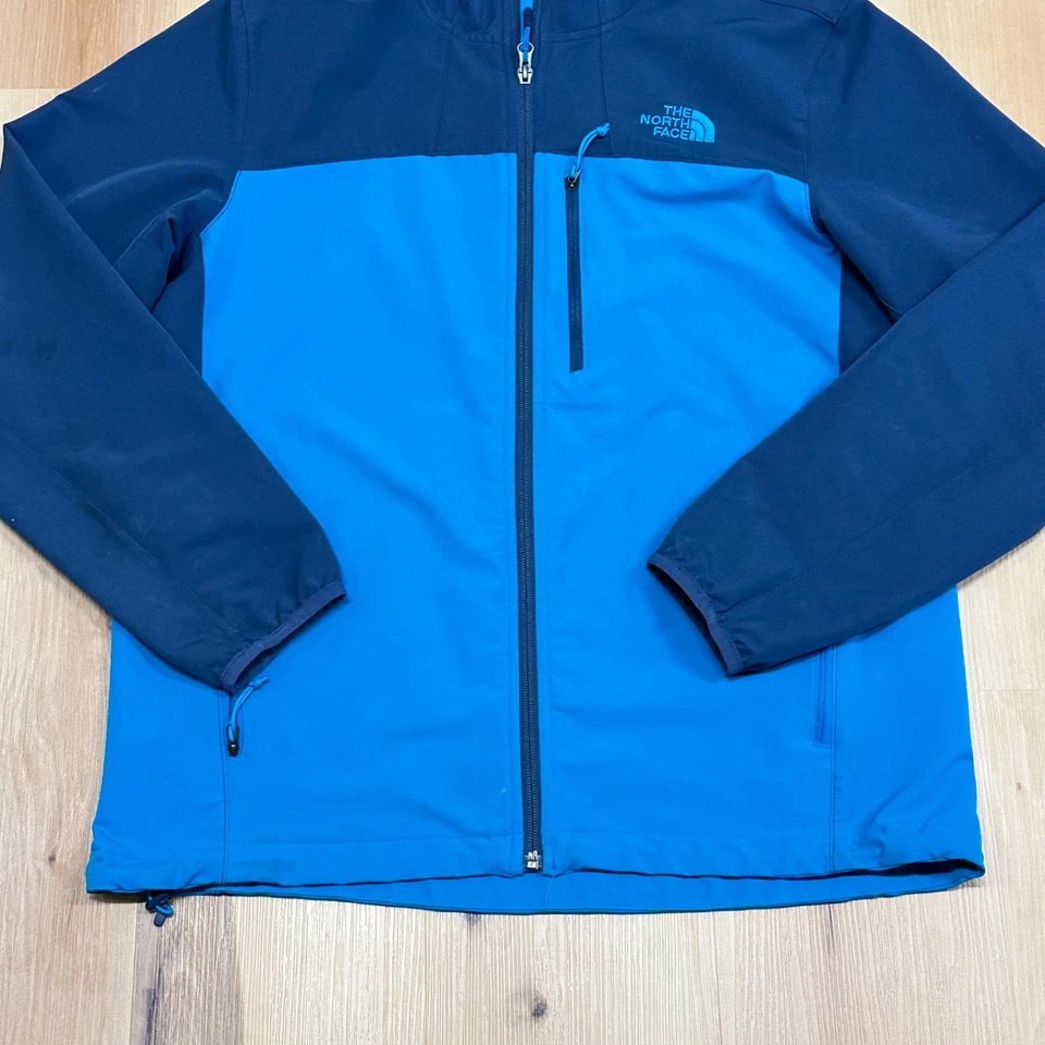 Chaqueta cortavientos The North Face para hombre grande rendimiento elástica con capucha azul Foto 3 de 4