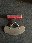 Antique red handle kitchen utensil for slicing — photo 1