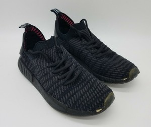 nmd r1 primeknit stlt triple black
