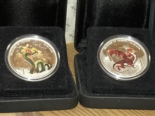 2 x Dragons of Legend - Chinese + Red Welsh Dragon - 1 Oz Silber PP