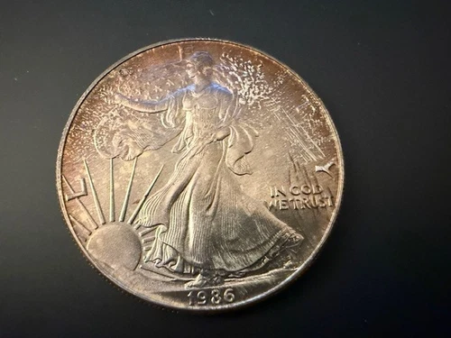 1986 WALKING LIBERTY AMERICAN EAGLE .999 FINE SILVER DOLLAR FRONT TONING