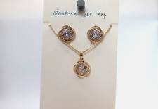 Elegant Gold Tone Circular Swirl Necklace Earrings Jewelry Set
