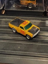 AURORA AFX #211 DATSUN BAJA PICKUP TRUCK  SLOT CAR 1970s IN YELLOW Magnatration 