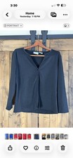 Kathy Ireland Stretch black blouse, likely a V-neck button-down style Size Large