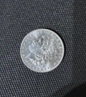 1887 Morgan 90% Silver Dollar cleaned great condition coin