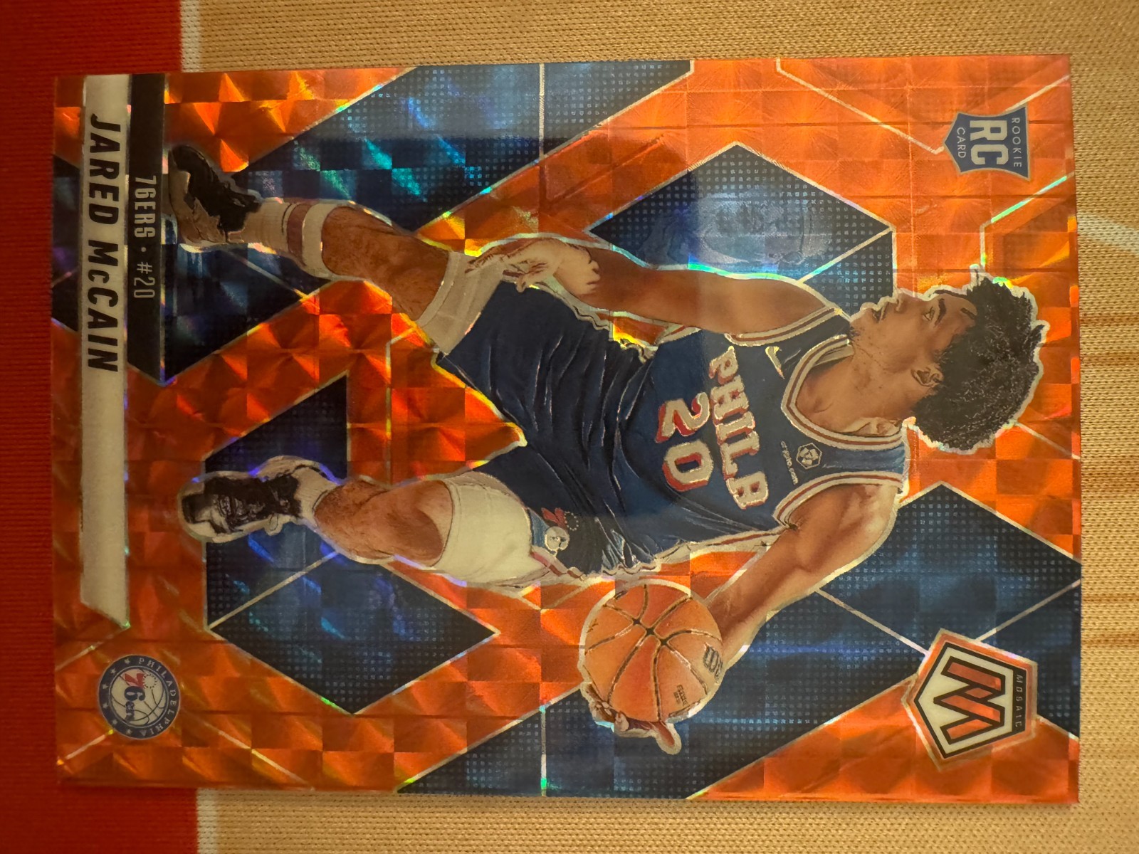 2024-25 Panini Mosaic - Rookies Jared McCain #228 Orange Mosaic Prizm /249 (RC)