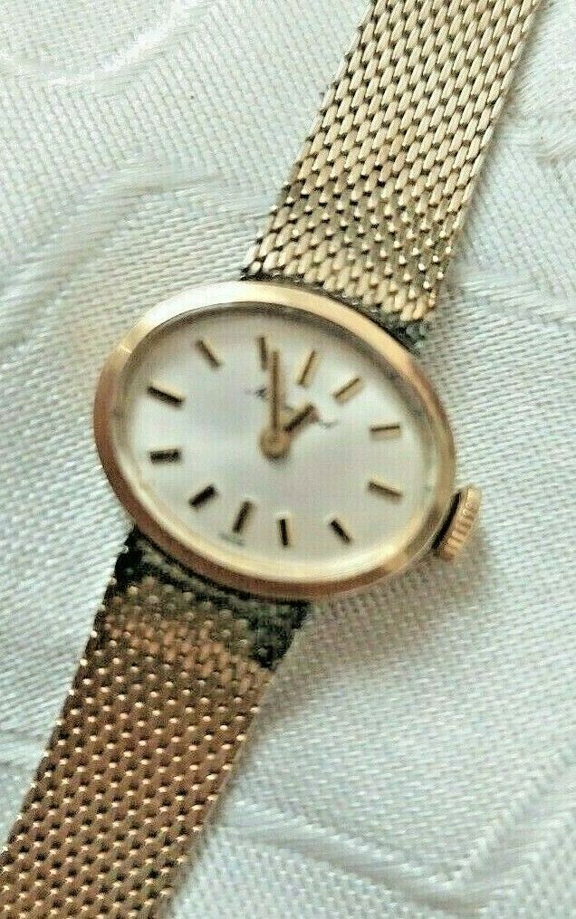 mathey tissot gold watch