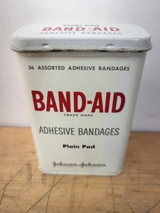 New old Stock Metal Band- Aid Tin with all 36 Assorted Adhesive Bandages inside!