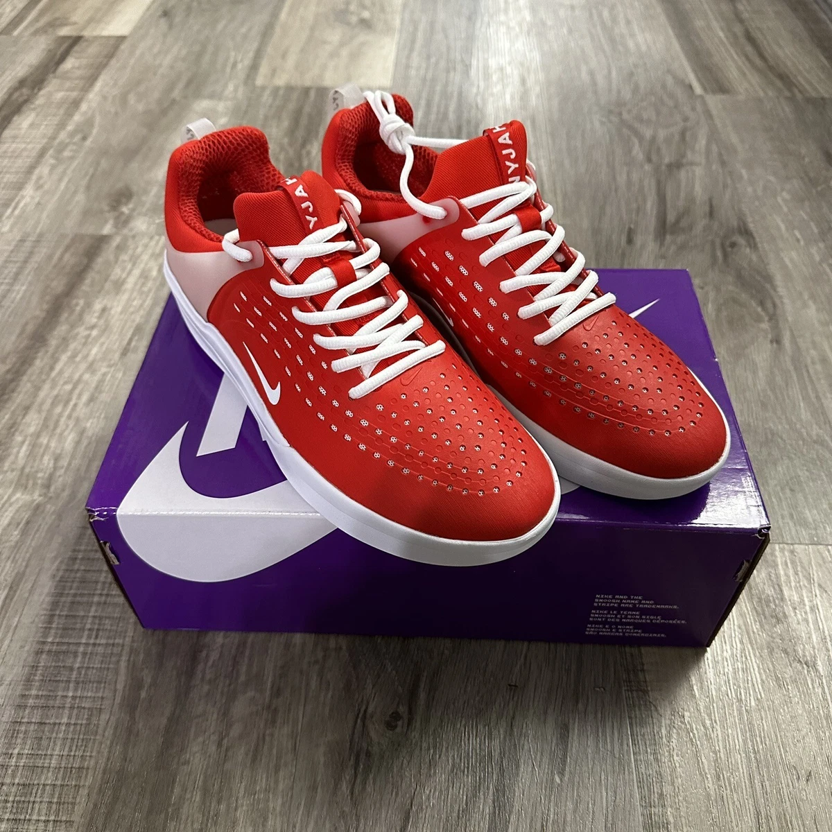 Nike nyjah best sale red