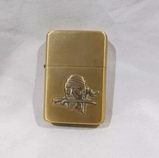 Collectible Star Lighter TS1102 Brass color Buccaneer face with dagger