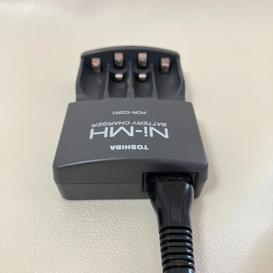 Cargador de batería Toshiba PDR-CGR1 Ni-MH para cámara fotográfica digital PDR-T15 100 V Foto 4 de 4