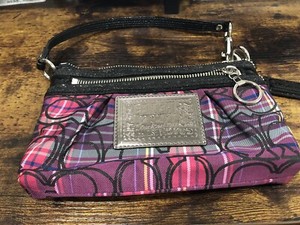 black and purple coach purse
