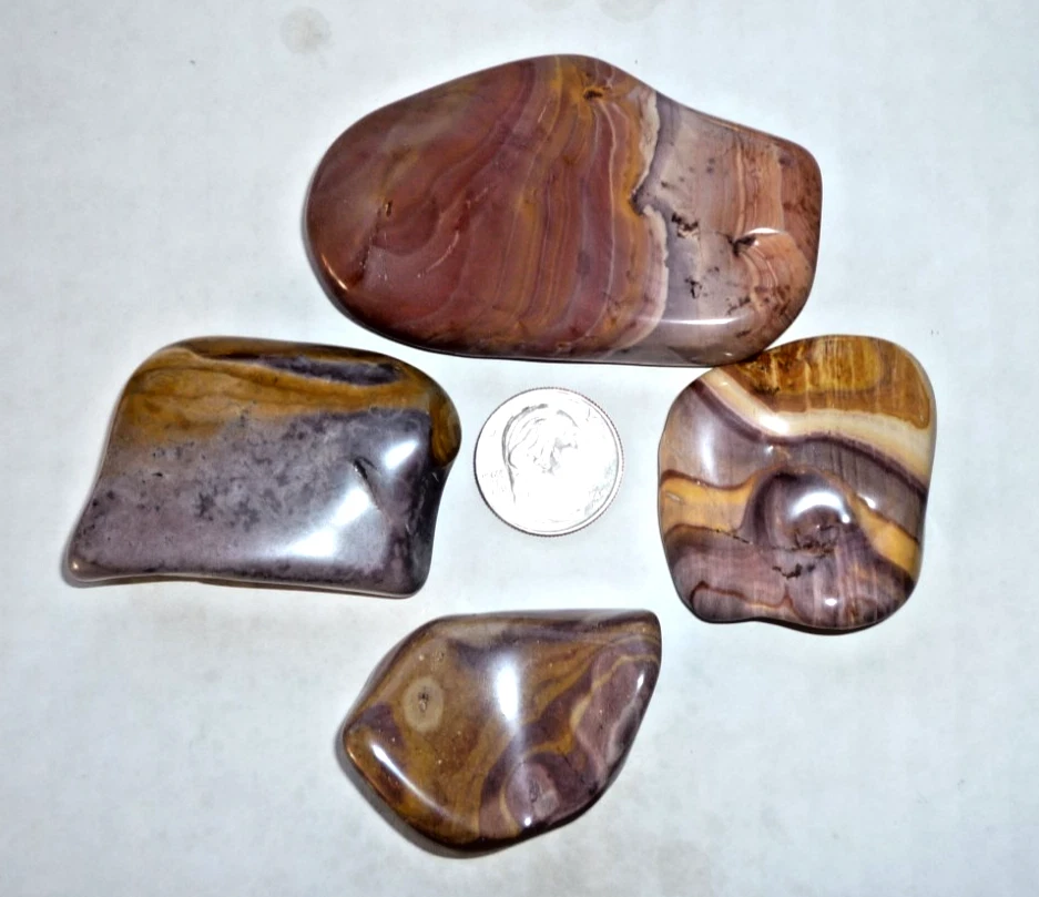 Piedra de bolsillo de palma bandas multicolores Wonderstone riolita rocas pulidas Utah Foto 2 de 2