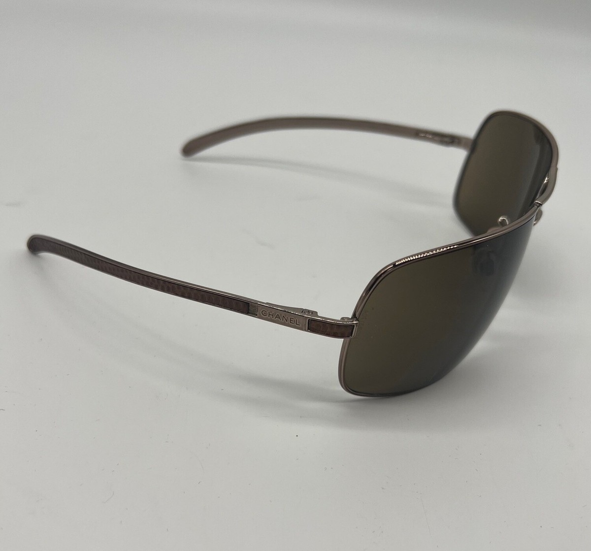 CHANEL アビエーターサングラス ゴールド ブラウン CHANEL Sunglasses: Pilot Sunglasses, titanium & calfskin