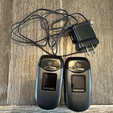 Lot Of 2 Old Vintage Samsung Cell Phones with charge cord