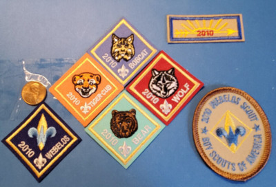 BSA 2010 lot of 7 Centennial Cub Scout Rank Badges, with both Webelos Badges.