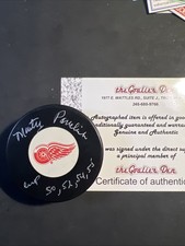 NHL- Marty Pavelich- Autographed Detroit Red Wings  Puck - w/ “Cups 50,52,54,55”