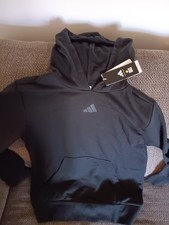 NUEVO CON ETIQUETAS NIÑOS ADIDAS SUDADERA/SUDADERA CON CAPUCHA NEGRA/AMARILLA TALLA XL, NUEVA CON ETIQUETAS, $52,,