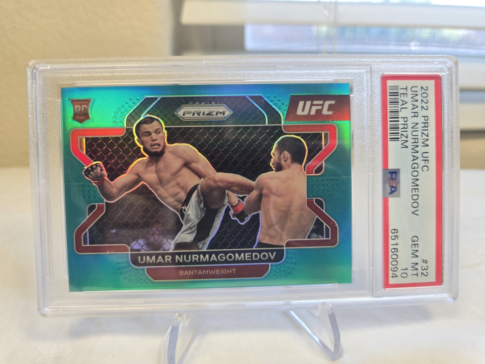 2022 Panini UFC Umar Nurmagomedov RC Teal Prizm /49 PSA 10 #32 view 1