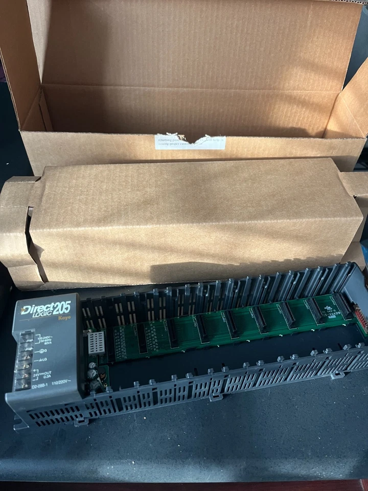 Base DirectLOGIC DL205, 9 ranuras, riel DIN o montaje en panel con alimentación auxiliar 24VDC 300mA Foto 2 de 3