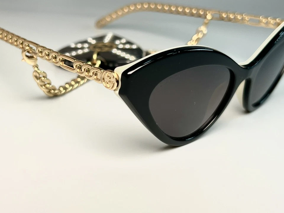 Nuevas gafas de sol Gucci para mujer GG0978S ojo de gato negras/doradas 52-140 cadena corazón Italia Foto 4 de 4