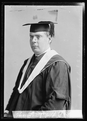Photo:D.W. Baker Graduation Portrait in Cap and Gown