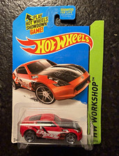 Hot Wheels RocketFire HW Workshop 1:64 Diecast Car Red/Black/White 2009 Unopened