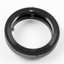 Unbranded T-Mount Lens Adapter for Olympus OM-System 35mm Cameras