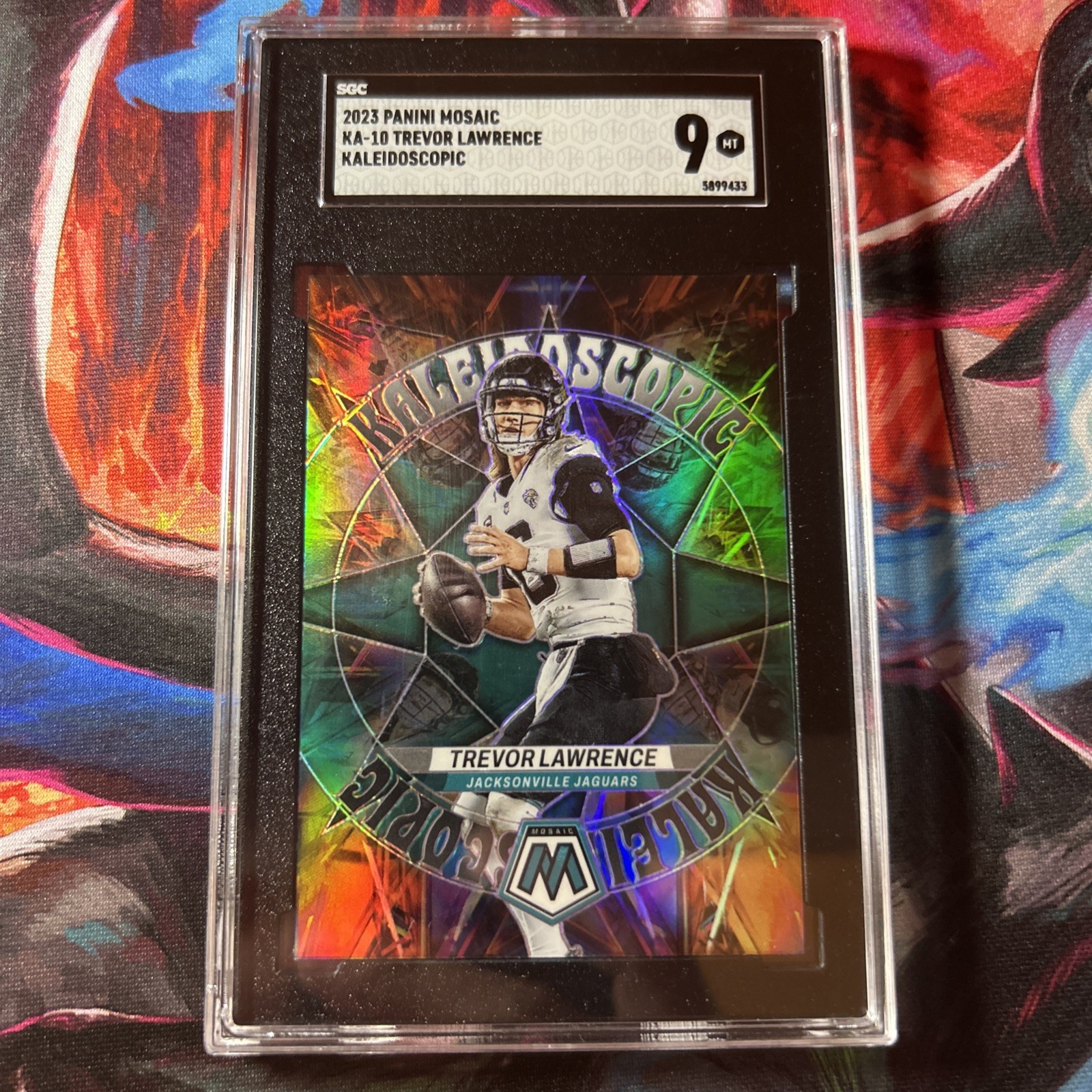 Trevor Lawrence #KA-10 (Football Cards 2023 Panini Mosaic Kaleidoscopic) — is it worth grading?