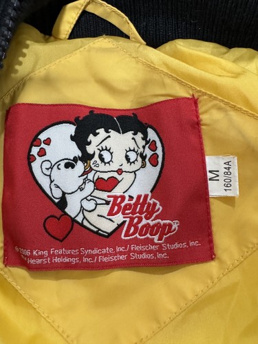 Chaqueta tampón con capucha amarilla vintage 2006 Betty Boop talla M Fleischer Studios Inc - Imagen 7 de 10