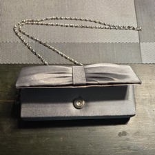 Charming Charlie Silver Clutch Bow Accent Chain Strap Metallic Finish