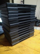 15 Empty DVD Cases - plastic covers are still intact.