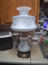 The item pictured is a vintage Quoizel Abigail Adams collection hurricane table