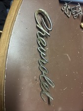 Oem 1964 Chevrolet Script Grill Emblem Badge Ornament